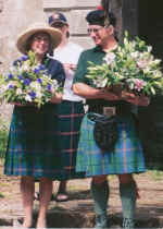 Richard and wife Trish receiving flowers celebrating 20 years as our Chief