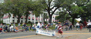 group in front of the Florida capital and on the parade route