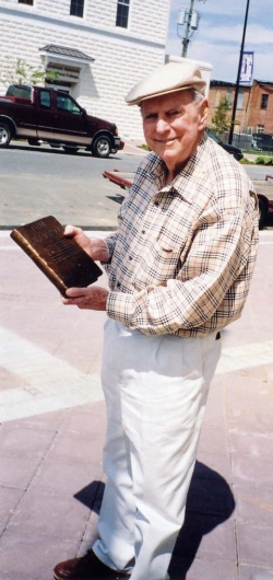 Mr Gene Vereen with bronze Greatest Generation book