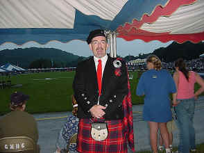 Mark Simmons of Clan Fraser about to light the torch for the Calling of the Clans 