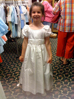 Stirling modeling her flower girl dress for an upcoming family wedding. 