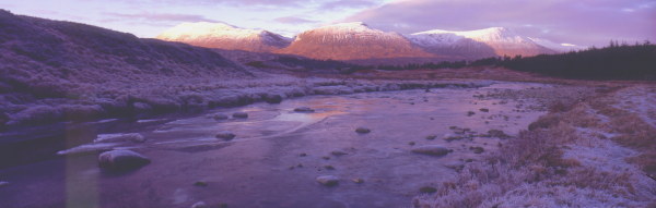 Winter twilight near Bridge of Orchy.Looking at three Munros (mountains over three thousand feet), Stob Coir' An  Albannaich, Stob Ghabhar, ClachLeathad. Lands with connections to Clan Campbell, Clan Henderson & Clan MacIntyre.