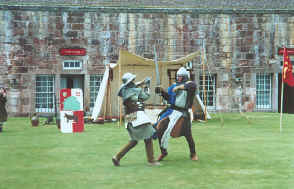 At Fort George, near Inverness, historical re-enactors have at it with broadswords.