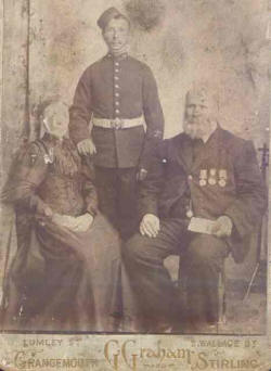 Gunner Edward Bolton with wife and son