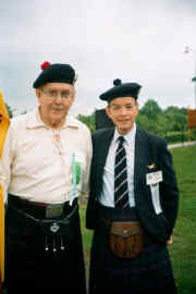 Kenneth Urquhart of Urquhart, right, and his standard bearer